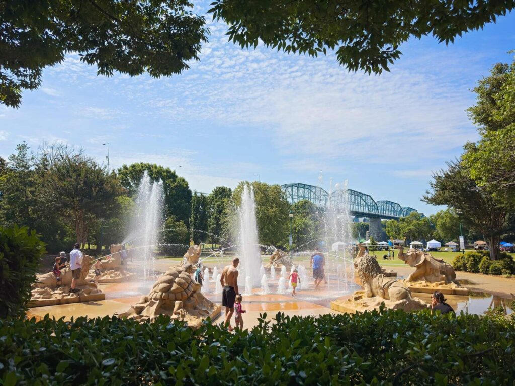 Families enjoying splash fountain at Coolidge Park in Chattanooga, Tennessee