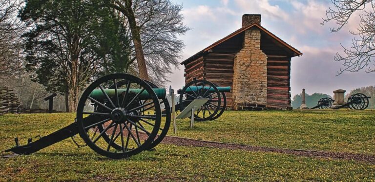 a historic cannon and log house in point park lookout mountain tennessee