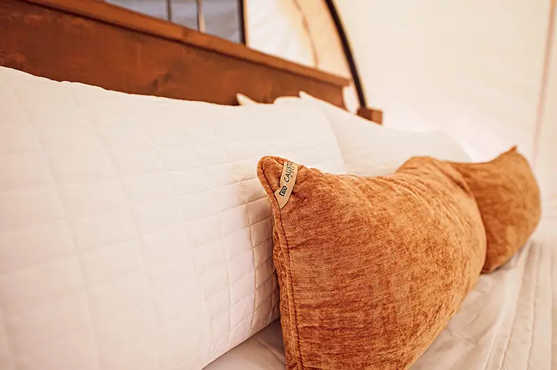 covered wagon camping luxury bedding